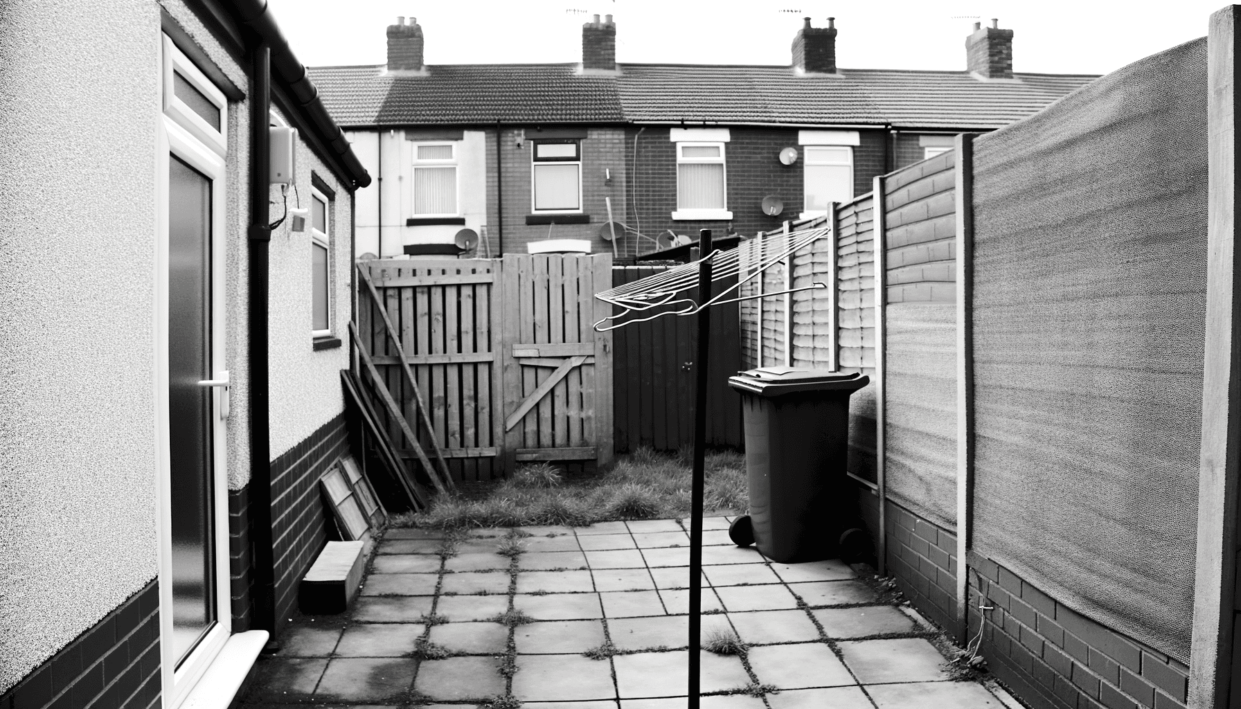 UK terraced house with small garden showing potential heat pump placement
